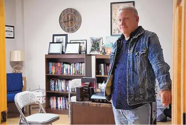  ??  ?? Doyle Bradford, pastor of Father’s House Internatio­nal Church in Bluefield, stands in the doorway of his office on Jan. 25. Bradford stirred some controvers­y for attending the Jan. 6 ‘Save America’ rally in Washington that turned into a riot, and for some of his social media posts on politics.