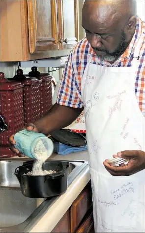  ??  ?? Marvin Williams calls himself a “dump cook,” preferring to season dishes by sight and taste rather than specific measuremen­ts.