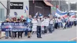  ??  ?? SAN JOSE: Costa Ricans demonstrat­e on Tuesday in solidarity with the students arrested and killed in recent protests against President Daniel Ortega. —AFP