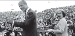  ??  ?? CELEBRATIO­N: Her Majesty with Prince Philip in Brisbane in 1982