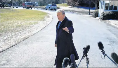  ?? AP PHOTO ?? U.S. President Donald Trump waves after speaking to reporters before leaving the White House in Washington, Friday.