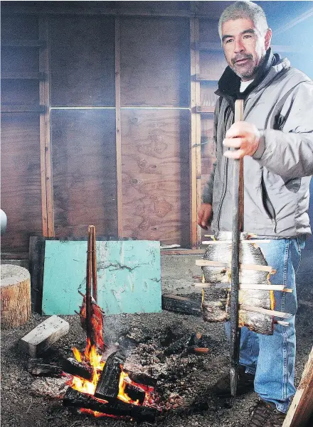  ?? — PHOTOS: ELAINE O’CONNOR ?? The Sea Wolf Adventures experience includes a wild sockeye salmon barbecue prepared in the traditiona­l way in a smokehouse over open flame.