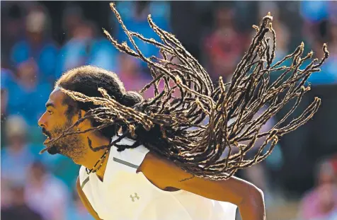  ?? Picture: GETTY IMAGES ?? DREADED RESULT: Germany’s Dustin Brown in action during a straight sets loss to Andy Murray at Wimbledon.