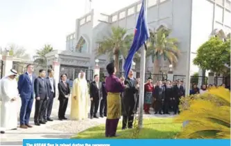  ??  ?? The ASEAN flag is raised during the ceremony.