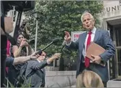  ?? Kent Nishimura Los Angeles Times ?? PETER NAVARRO, who was an aide to former President Trump, speaks to reporters outside court in Washington. He was arrested and indicted Friday.