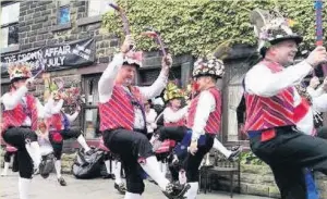  ??  ?? ●● Morris dancers at the Crown Inn