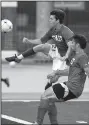  ?? Arkansas Democrat-Gazette/MITCHELL PE MASILUN ?? Nathan Simons of Jonesboro (left) outscrambl­es a West defender during Wednesday’s allstar boys soccer game at Estes Stadium in Conway. Simons was named the East team’s outstandin­g player, but the West held on for a 3-2 victory.