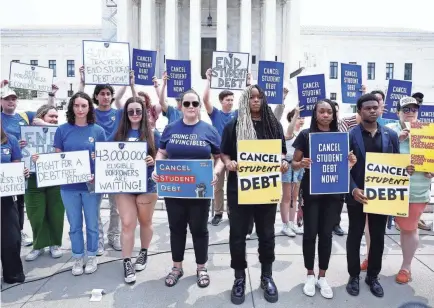  ?? PAUL MORIGI/GETTY IMAGES ?? Student loan borrowers rally outside the Supreme Court on June 30.