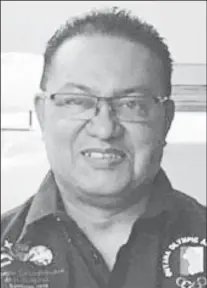  ?? ?? The late Gokarn Ramdhani served as the badminton head coach of Broncos Athletics.