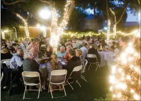  ?? RECORDER PHOTO BY CHIEKO HARA ?? Trees adorned with lights and elegant decor helped to create a special ambience at Portervill­e Arts Associatio­n’s ‘A Night To Remember’ event Saturday, Oct. 13, 2018 at Nuckols Ranch.