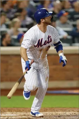  ?? ASSOCIATED PRESS ?? NEW YORK METS’ PETE ALONSO watches his solo home run during the fifth inning of Monday’s game against the Arizona Diamondbac­ks in New York.