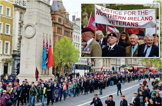  ??  ?? March for justice: Former troops carrying flags and banners protest in Whitehall yesterday