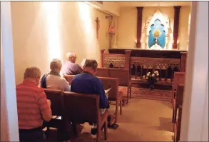  ?? Hearst Connecticu­t Media file photos ?? Visitors to the Adoration Chapel spend a moment reflecting and praying at St. John Fisher Seminary on Nov. 11, 2003.