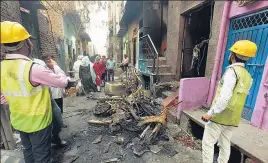  ??  ?? BSES worker Changing Brunt wire following communal riots in northeast Delhi in March, 2020. Delhi High Court recently ordered release of three activists involved in the case.