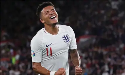  ??  ?? Jadon Sancho celebrates scoring England’s fourth goal – his first for his country – and it was the striker’s two goals that proved the difference against Kosovo. Photograph: David Klein/Reuters