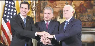  ?? Martin Mejia / Associated Press ?? Venezuela’s self-proclaimed interim president Juan Guaido, Colombia’s President Ivan Duque and Vice President Mike Pence, after a meeting of the Lima Group concerning Venezuela at the Foreign Ministry in Bogota, Colombia, on Monday. Pence’s appearance before the Lima Group comes two days after a U.S.-backed effort to deliver humanitari­an across the border from Colombia ended in violence.