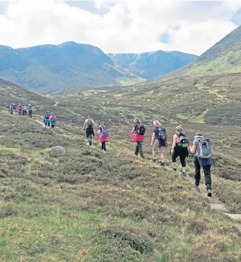  ??  ?? Walkers enjoy a trek through the Angus Glens during last year’s event.