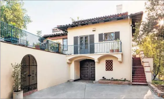  ?? Photograph­s courtesy of Meghan Bob Photograph­y, HartmanBal­dwin Design/Build ?? AFTER: Nearly 6,000 square feet is spread across three levels in the home, whose creator ran out of money to finish it as planned.