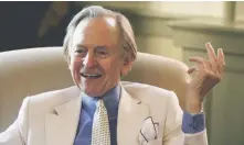  ?? AP FILE PHOTO ?? SARTORIAL SPLENDOR: Famed author Tom Wolfe is seen in his trademark white suit in this 2005 photo.