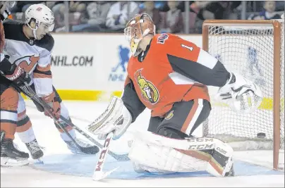  ?? NATHAN ROCHFORD/THE GUARDIAN ?? New Jersey Devil’s Nico Hischier scores on Ottawa Senator’s goaltender Mike Condon during first-period NHL exhibition action Monday night at Credit Union Place in Summerside.