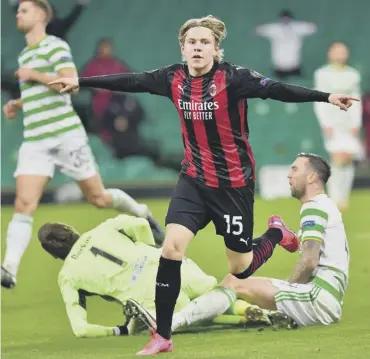  ??  ?? 0 Jens Petter Hauge of AC Milan celebrates after scoring his side’s third goal.