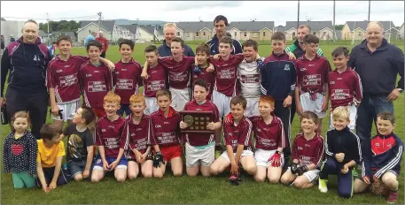  ??  ?? St.Peter’s thrilled to overcome St. Kevins in the Rebel Og North Cork U12 Football League Final at Churchtown.