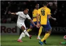  ?? ?? Boreham Wood’s Adrian Clifton scores the fourth goal against St Albans in the second round. Photograph: Nick Potts/PA