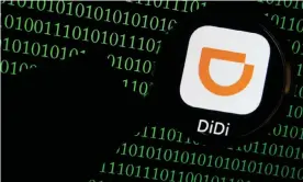  ??  ?? Didi was banned from listing its app on mobile app stores in China days after it floated on the New York stock exchange. Photograph: Florence Lo/Reuters