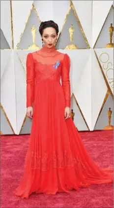  ?? FRAZER HARRISON, GETTY IMAGES ?? Ruth Negga is radiant in red Valentino.