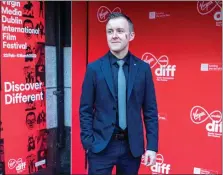  ?? PAUL FAITH — AFP VIA GETTY IMAGES ?? Irish director Colm Bairead poses on the red carpet at the opening ceremony of the Dublin Internatio­nal Film Festival.