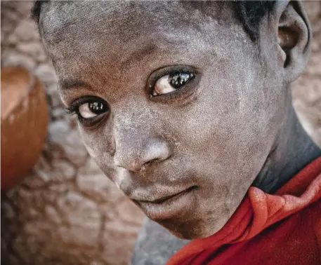  ??  ?? RIGHT
Young Malian boy, Bamako.