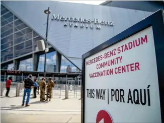  ?? ALYSSA POINTER/ALYSSA.POINTER@AJC.COM ?? The Mercedes-benz Stadium Community Vaccinatio­n Center is providing an average of 42,000 COVID-19 inoculatio­ns a week, the largest vaccinatio­n site in the Southeast.