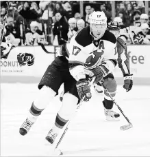  ?? TNS FILE PHOTO ?? Ilya Kovalchuk (17) works the puck against the Capitals in Washington, D.C., on Feb. 21, 2013, during his days with the New Jersey Devils. Kovalchuk has opted to return to the NHL with the Los Angeles Kings.