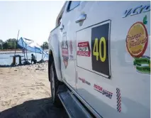  ??  ?? Above: Fair to compete even if it is just to get those stickers on your car. Top right: Cricket and unnecessar­ily dramatic appeals uniting the
diverse rally participan­ts at the Bomjir Artist Camp. Below: Crossing over the Brahmaputr­a on
the way back...