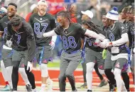  ?? JOHN LOCHER/ASSOCIATED PRESS ?? NFC wideout CeeDee Lamb (88) of the Dallas Cowboys, celebrates a touchdown during the Pro Bowl flag football event.