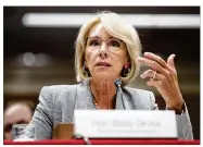  ?? TOM BRENNER/NEW YORK TIMES ?? Education Secretary Betsy DeVos wants to roll back Obama-era regulation­s, making it harder for students who say they were defrauded by colleges and universiti­es to erase their debts.