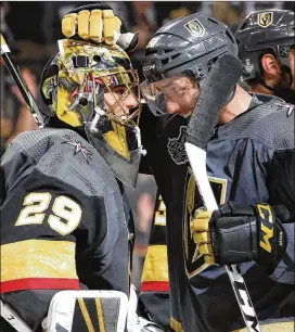  ?? BRUCE BENNETT / GETTY IMAGES ?? Marc-Andre Fleury (29) and Tomas Nosek of the Vegas Golden Knights celebrate their team’s 6-4 win in Game 1 of the Stanley Cup Final on Monday.