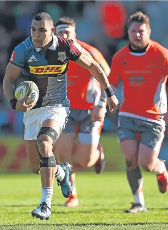  ??  ?? ■
Joe Marchant of Harlequins breaks away to score against Newcastle.