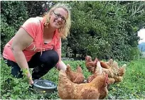  ?? VIRGINIA FALLON/STUFF ?? Helen Whitfield describes herself as a ‘‘crazy chicken lady’’.