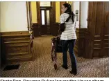  ?? DEBORAH CANNON / AMERICAN-STATESMAN ?? State Rep. Dawnna Dukes leaves the House chamber after adjournmen­t at the Capitol on Tuesday. Dukes is likely to go to trial in the fall on corruption charges.