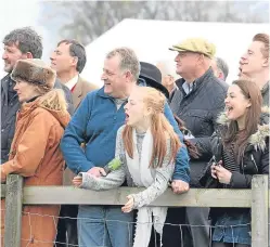  ??  ?? A record crowd cheers on the competitor­s at Balcormo.