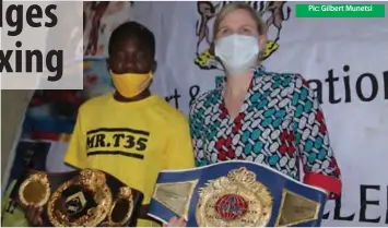  ??  ?? Pic: Gilbert Munetsi
New WBO Africa welterweig­ht champion Brendon "Boika" Denes presented his belts to Youth, Sport, Arts and Recreation Minister Kirsty Coventry at a ceremony to welcome the boxer in Harare yesterday. Denes beat Namibian Victor Shonena in the 6th round to claim the continenta­l title on Saturday.