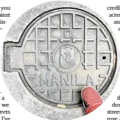  ??  ?? Manhole at Manila city hall