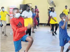  ?? CONTRIBUTE­D ?? Students of Ferncourt High School in St Ann engage in a physical workout during National School Moves Day activities at the institutio­n on Friday.