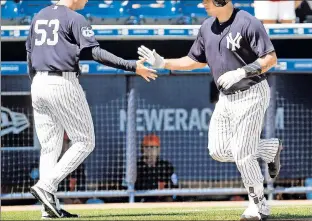  ?? Getty Images ?? DINGER TIME: Gary Sanchez rounds third base after hitting a homer in the Yankees’ 7-1 exhibition win over the Tigers on Saturday at George M. Steinbrenn­er Field.