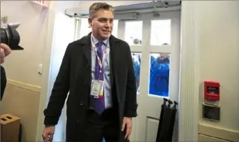  ?? Manuel Balce Ceneta/Associated Press ?? CNN’s Jim Acosta enters the Brady press briefing room Friday at the White House after judge restored his credential­s. a