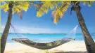  ??  ?? PARADISE ISLAND Antigua beach
