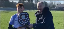  ??  ?? Seamus O Broin receiving the shield from Pat Henderson.