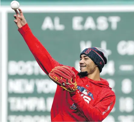  ?? ELISE AMENDOLA/THE ASSOCIATED PRESS ?? Red Sox outfielder Mookie Betts may be asked to play second base when the World Series shifts to L.A.