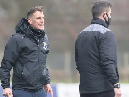  ??  ?? Family business: Dean Shiels lets the officials know what he thinks during Saturday’s game